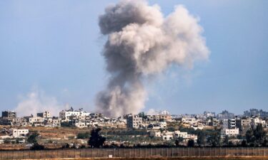 A smoke plume from an explosion in Gaza as seen from a position along Israel's southern border with the Palestinian enclave on May 13.