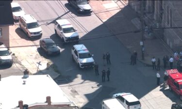 Police work at the scene of a shooting in Chester