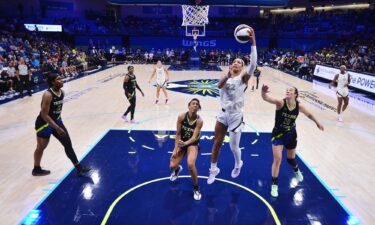 A'ja Wilson drives to the basket during the game against the Dallas Wings.