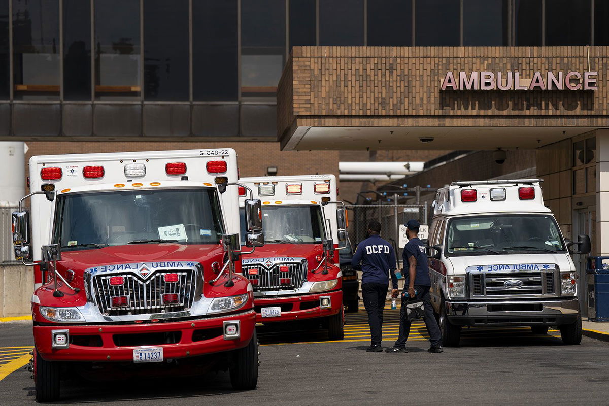 <i>Al Drago/Bloomberg/Getty Images via CNN Newsource</i><br/>Ambulances are pictured outside of Howard University Hospital during high temperatures in Washington