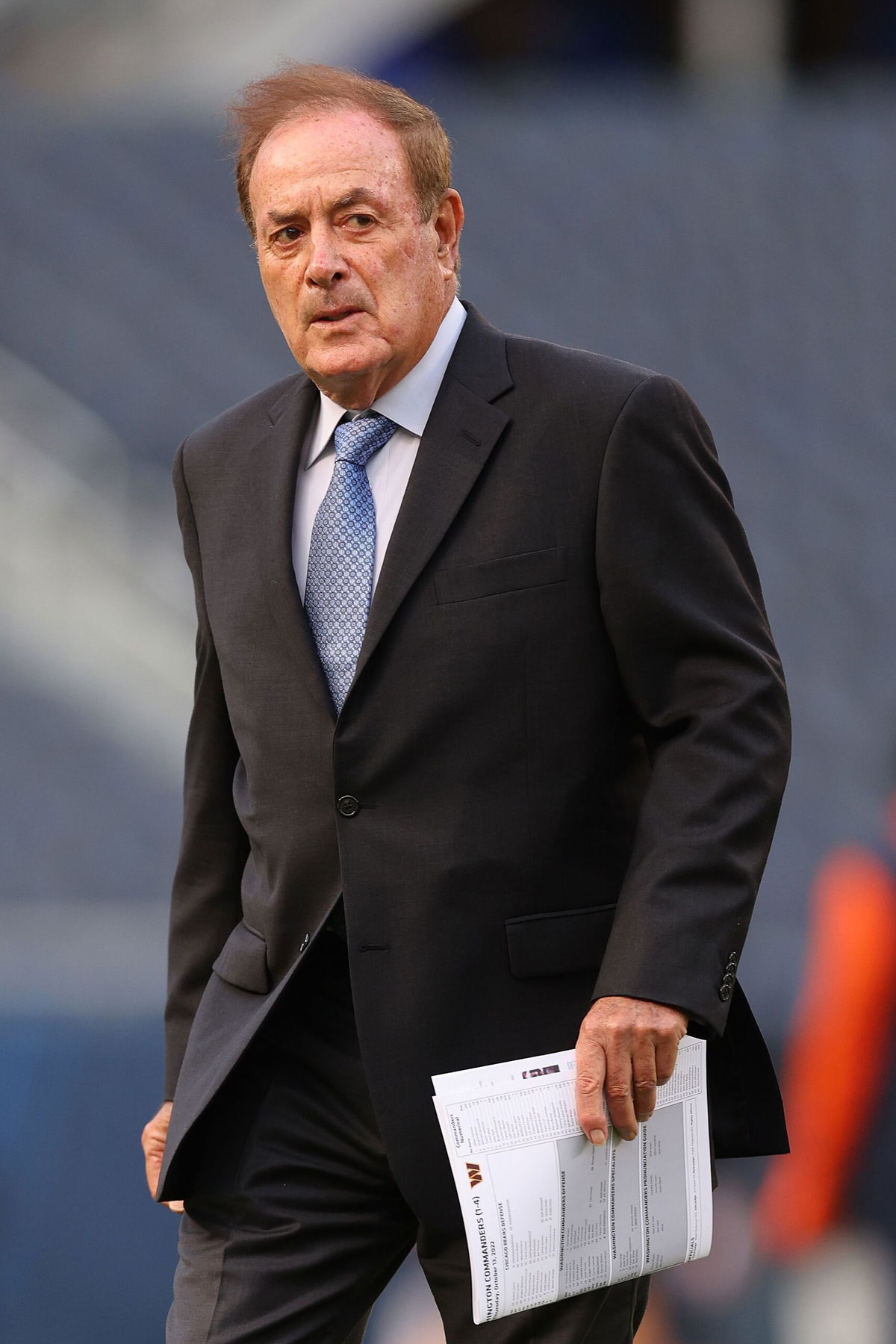 <i>Michael Reaves/Getty Images via CNN Newsource</i><br/>Sports commentator Al Michaels looks on prior to the game between the Chicago Bears and the Washington Commanders at Soldier Field in October 2022 in Chicago