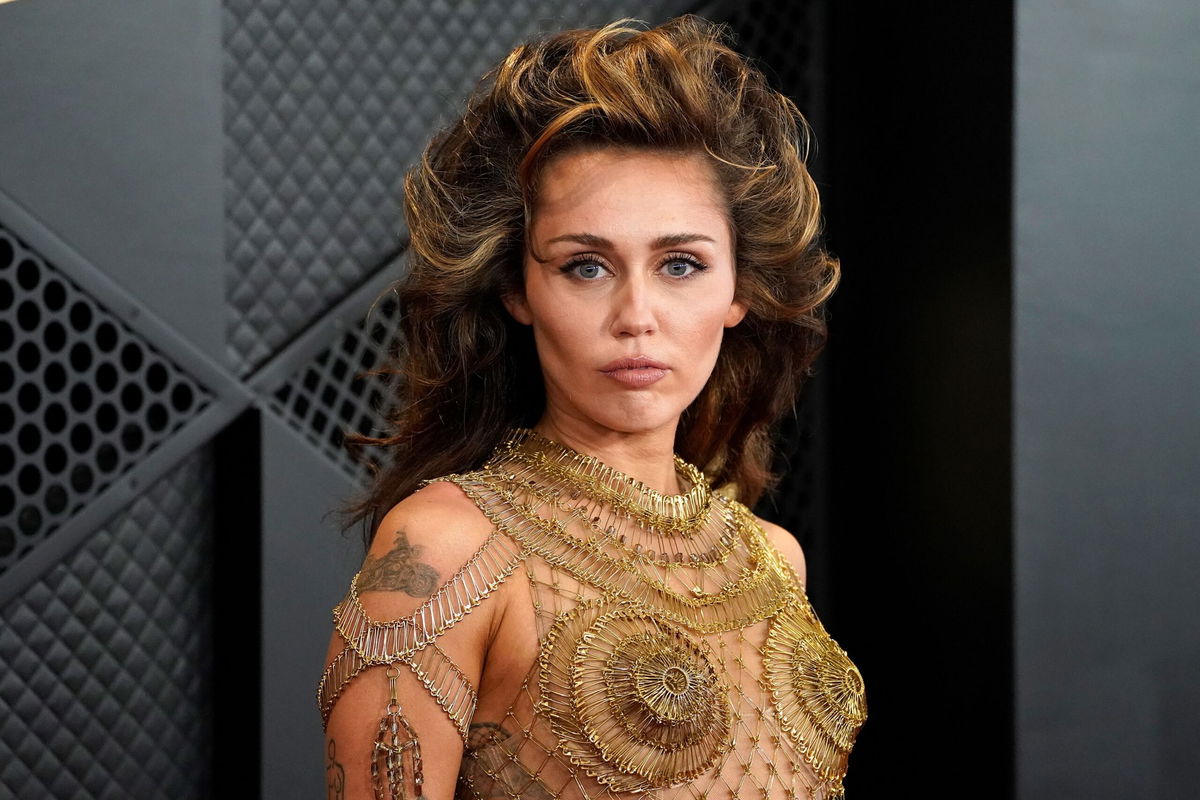 <i>Jordan Strauss/Invision/AP via CNN Newsource</i><br/>Miley Cyrus arrives at the 66th annual Grammy Awards on February 4 in Los Angeles. Cyrus recently revealed that she has a complicated relationship with her father