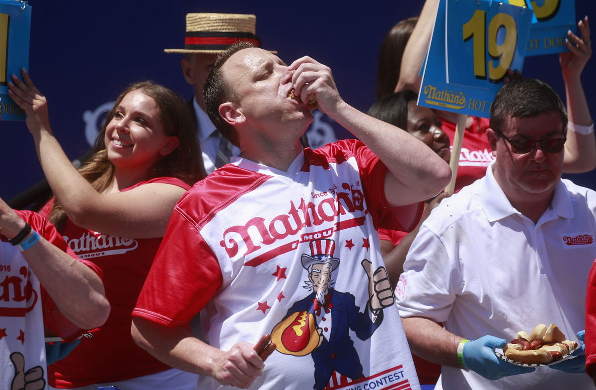 <i>Mario Tama/Getty Images via CNN Newsource</i><br/>Chestnut (left) has become synonymous with the competition over the years.