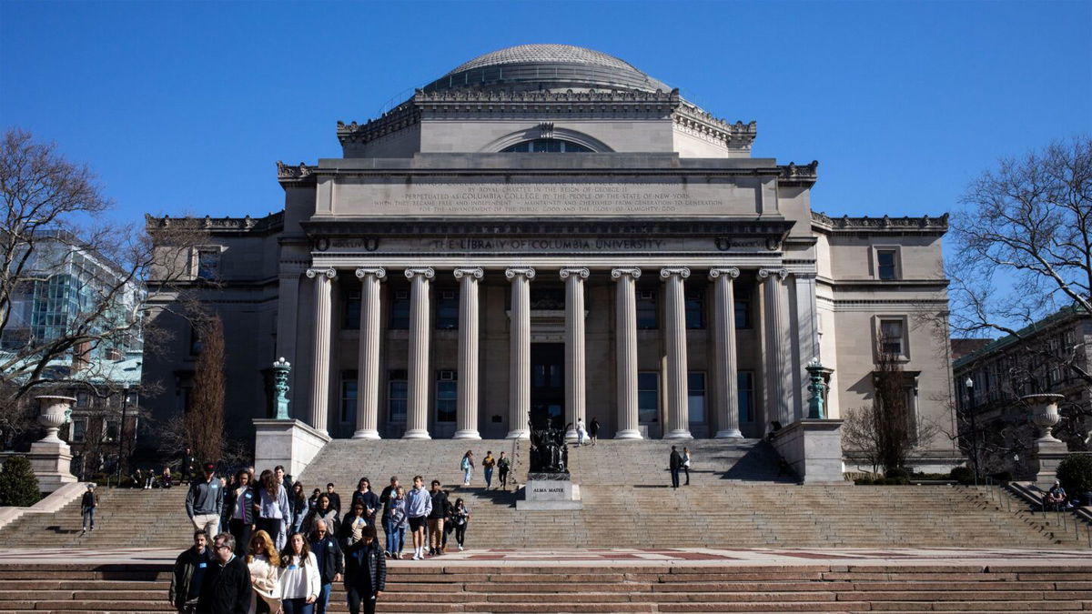 <i>Jeenah Moon/Getty Images via CNN Newsource</i><br/>People walk on the Columbia University campus on March 9