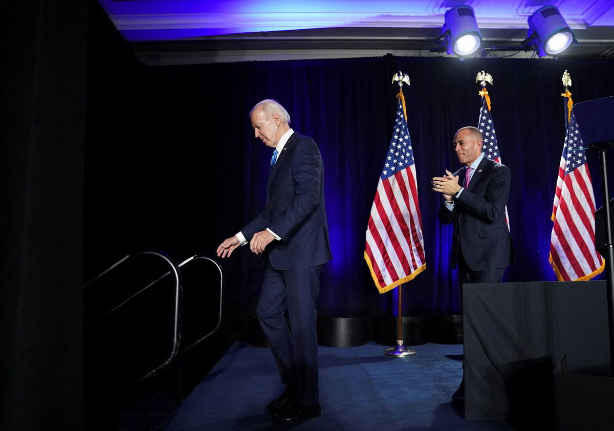 <i>Kevin Lamarque/Reuters via CNN Newsource</i><br/>President Joe Biden and House Minority Leader Hakeem Jeffries attend the House Democratic Caucus Issues Conference in Baltimore