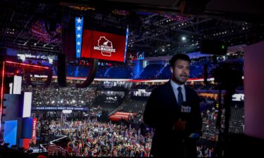 A TV reporter at the scene of the Republican National Convention at Fiserv Forum in Milwaukee