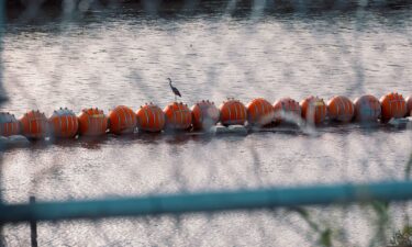 Buoys meant to deter migrant crossings in the Rio Grande River in Eagle Pass