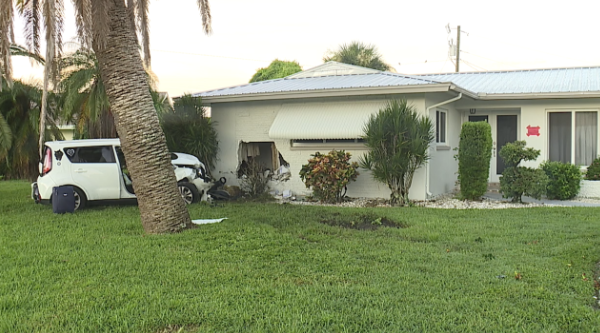 <i>WFTX via CNN Newsource</i><br/>A car crashed into the front of a home on Palm Tree Blvd in Cape Coral