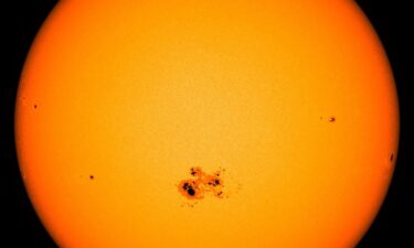 A cluster of sunspots appears on the surface of the sun on October 18