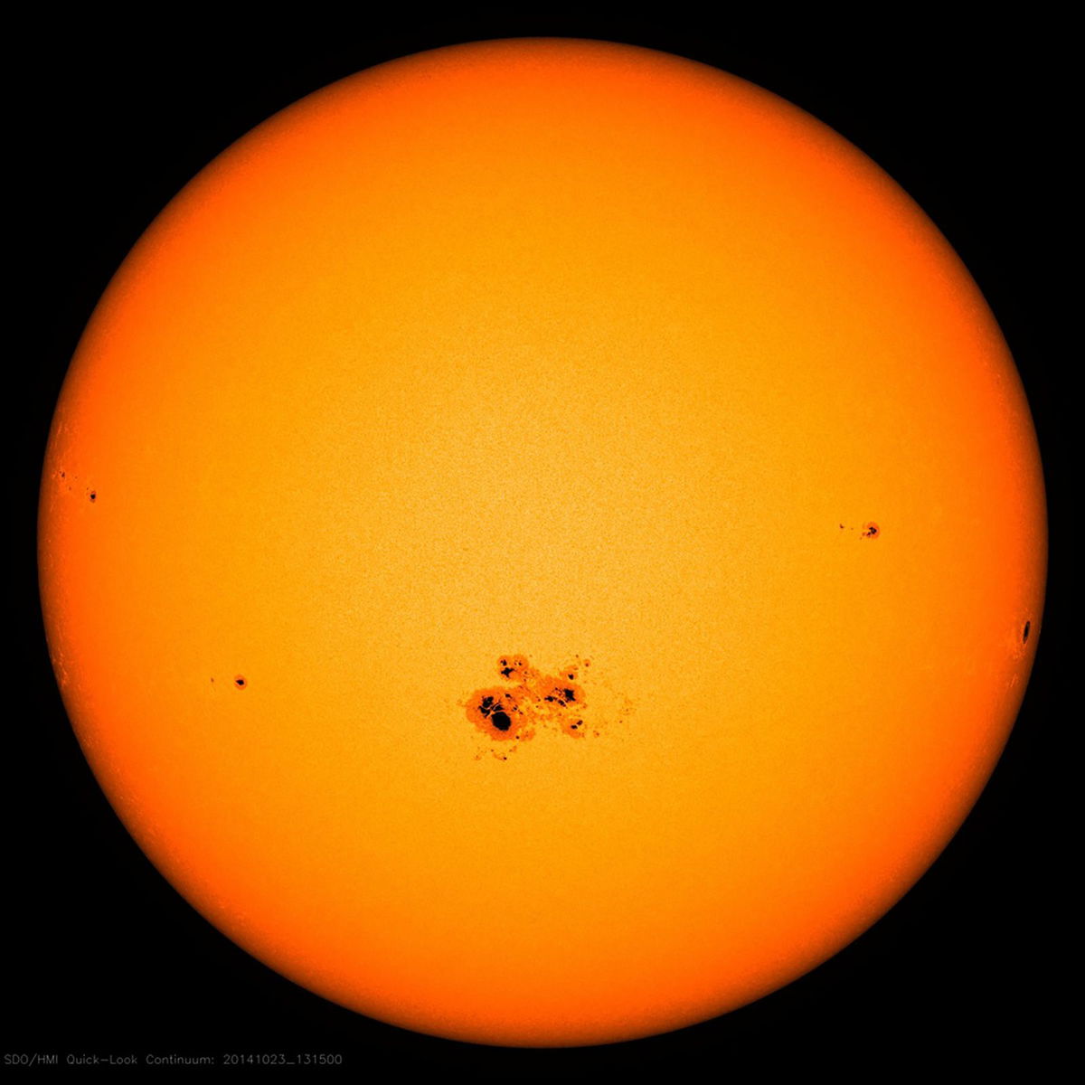 <i>NASA Goddard via CNN Newsource</i><br/>A cluster of sunspots appears on the surface of the sun on October 18