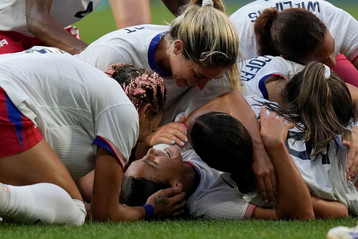 <i>Silvia Izquierdo/AP via CNN Newsource</i><br/>United States' Sophia Smith celebrates with team mates the opening goal during a women's semifinal soccer match between the United States and Germany.