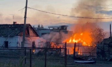 Russian authorities help residents during evacuation efforts at a railway station in Oryol