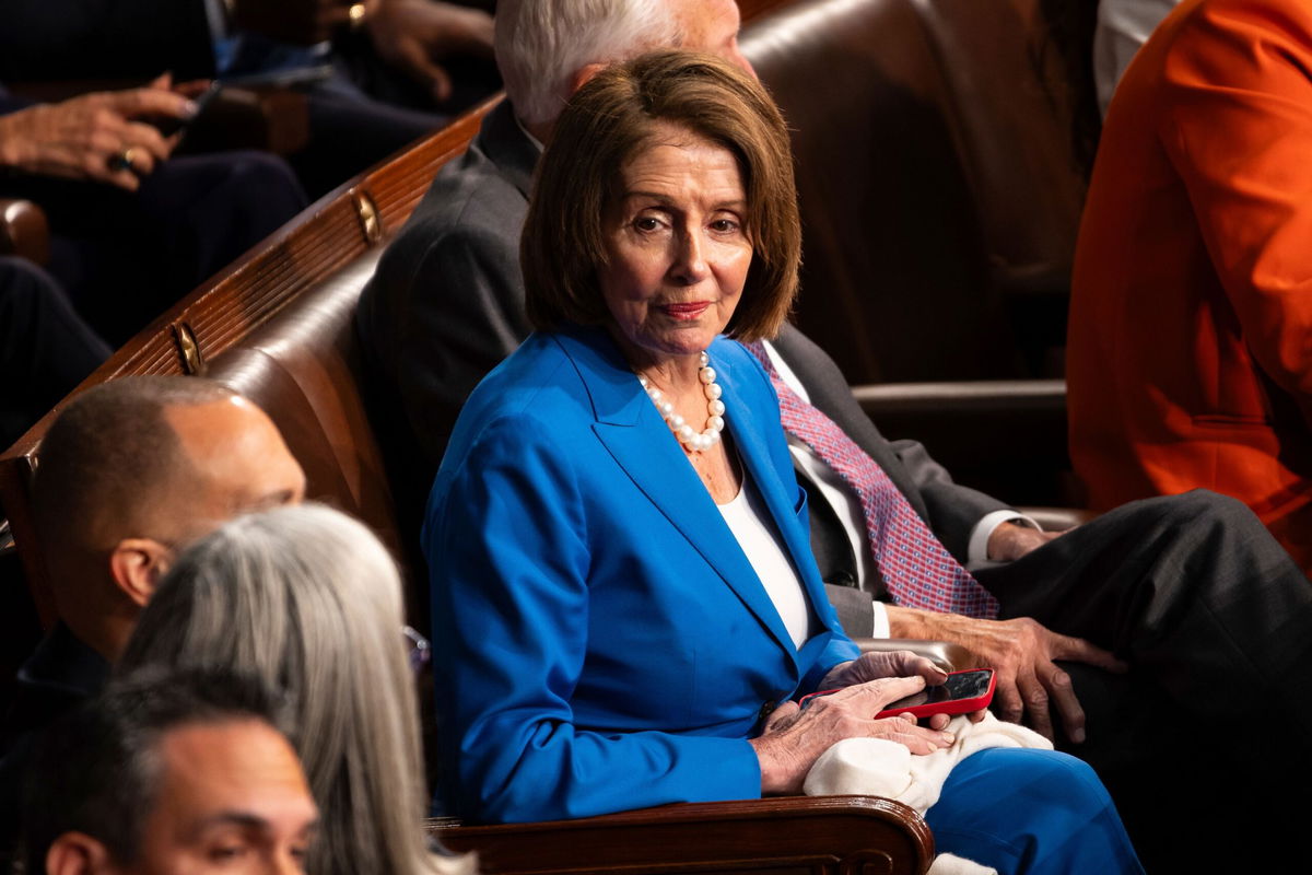 <i>Francis Chung/Politico/AP via CNN Newsource</i><br/>House Speaker Emerita Nancy Pelosi (D-Calif.) is seen on the House floor during a vote to elect a Speaker of the House at the US Capitol in October 2023.