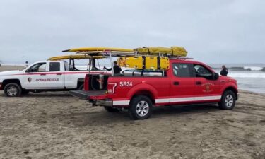 Emergency responders pulled a surfer from the water at Ocean Beach Friday morning and transported to an area hospital in critical condition