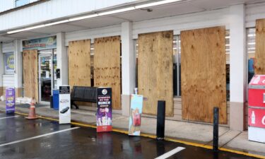 Store windows are boarded in Cedar Key in preparation for Hurricane Helene which is expected to make landfall as a Category 3 hurricane on September 26.