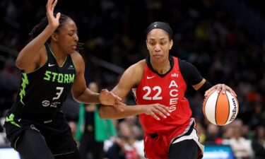 Las Vegas Aces superstar A'ja Wilson drives to the hoop against Nneka Ogwumike in the third quarter at Climate Pledge Arena.