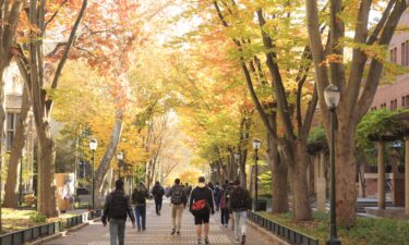 Students walk on the University of Pennsylvania's campus in Philadelphia. Fewer low-income students applied for college financial aid for the current school year after the rollout of an updated version of the Free Application for Federal Student Aid