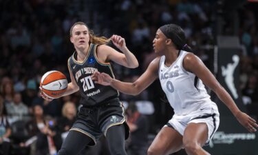 Connecticut Sun forward Brionna Jones shoots over Minnesota Lynx forward Alanna Smith.