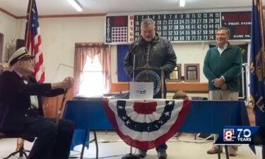 A crowd filled the American Legion hall in Oxford Sunday for a community celebration marking local resident John Crumpton's 100th birthday.