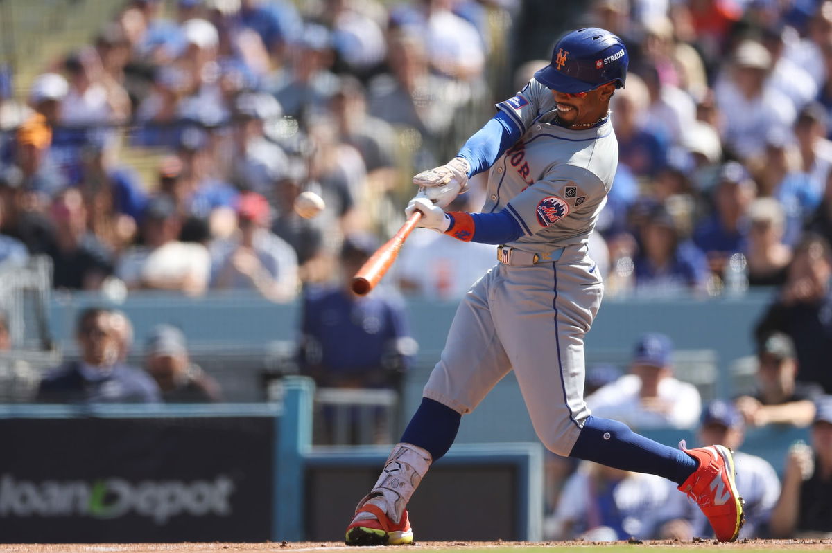 <i>Harry How/Getty Images via CNN Newsource</i><br/>Mets shortstop Francisco Lindor hits a first inning home run to give New York an early lead.