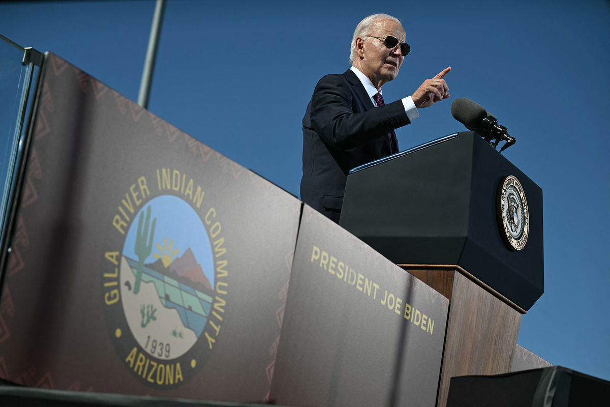 <i>Andrew Caballero-Reynolds/AFP/Getty Images via CNN Newsource</i><br/>President Joe Biden speaks at the Gila River Crossing School in the Gila River Indian Community