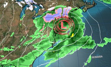 A quick-moving storm is bringing rain to parts of the East Coast while a few snowflakes fall around the Great Lakes.