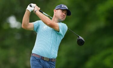 American golfer Brian Harman plays his shot from the 18th tee during the third round of the Memorial Tournament at Muirfield Village Golf Club in June. Harman said on November 19 that a woman is in a coma after trying to save his son from drowning in October.