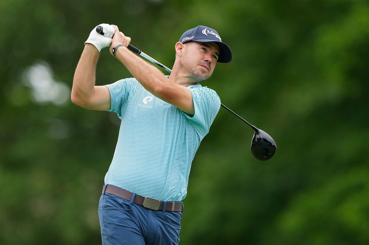 <i>Dylan Buell/Getty Images via CNN Newsource</i><br/>American golfer Brian Harman plays his shot from the 18th tee during the third round of the Memorial Tournament at Muirfield Village Golf Club in June. Harman said on November 19 that a woman is in a coma after trying to save his son from drowning in October.