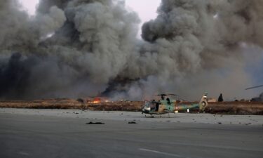 Smoke billows following Israeli airstrikes in Damascus on December 10.