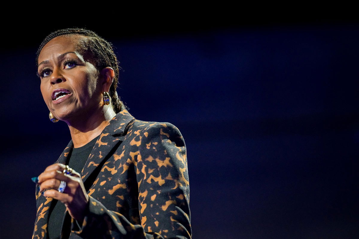 <i>Brandon Bell/Getty Images/File via CNN Newsource</i><br/>Michelle Obama speaks at the Wings Event Center on October 26