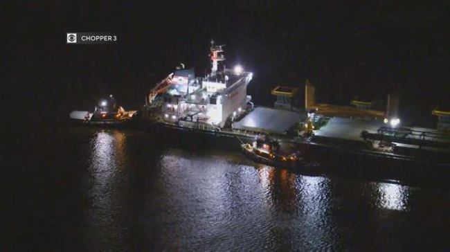 <i>KYW via CNN Newsource</i><br/>Multiple small boats were working to dislodge a cargo ship that became stuck in the Delaware River near Philadelphia.