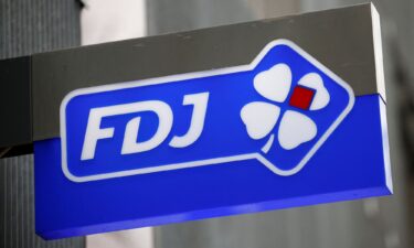 The logo of French lottery company La Francaise des Jeux (FDJ) is pictured. A French man whose stolen credit card was used to buy a winning lottery ticket has offered to split the jackpot with the two thieves.