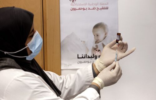 A nurse prepares a dose of measles vaccine in Morocco in February. Authorities in Morocco have been scrambling to contain an outbreak of measles.