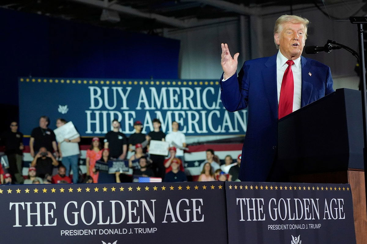 <i>Alex Brandon/AP via CNN Newsource</i><br/>President Donald Trump speaks during a rally in Warren