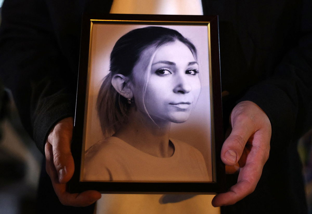 <i>Anatolii Stepanov/AFP/Getty Images via CNN Newsource</i><br/>Colleagues of Victoria Roshchyna attend a vigil in Kyiv