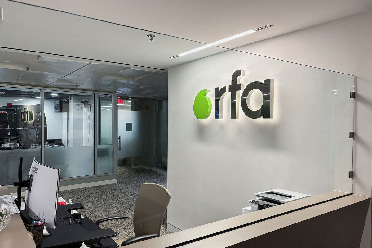 <i>Staff/Reuters via CNN Newsource</i><br/>A logo of Radio Free Asia is displayed in its office
