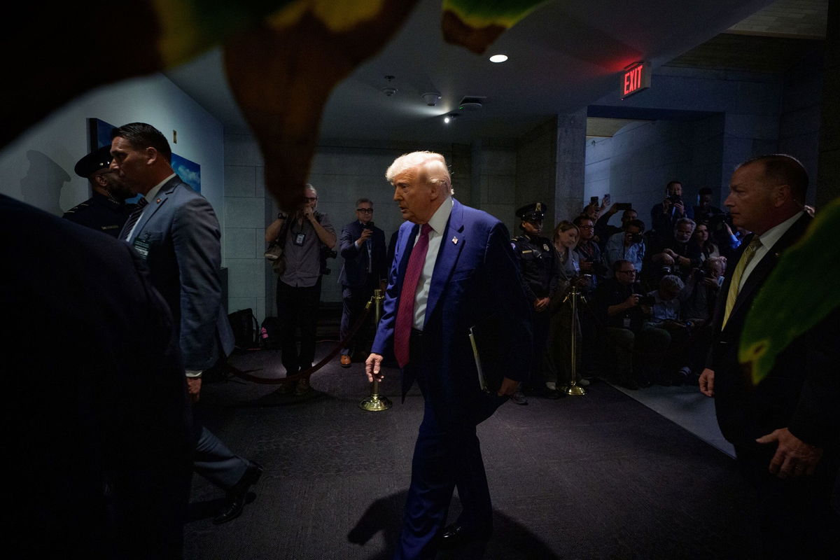 <i>Loren Elliott/Reuterrs via CNN Newsource</i><br/>A barge travels through the Houston Ship Channel