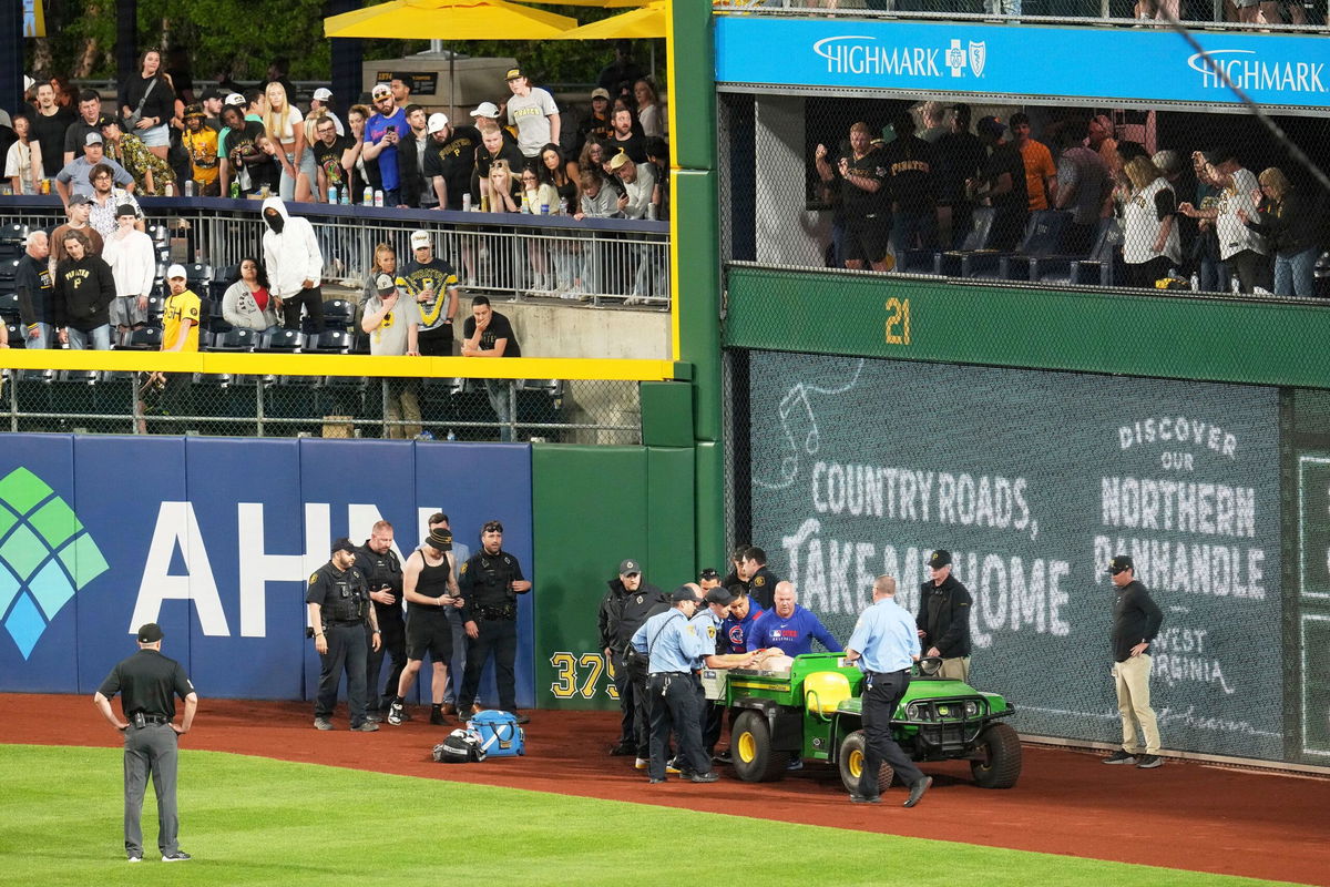 <i>Gene J. Puskar/AP via CNN Newsource</i><br/>A fan is carted of the field at PNC Park after falling from the stands.
