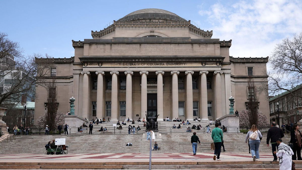 <i>Charly Triballeau/AFP/Getty Images via CNN Newsource</i><br/>Students are seen on the campus of Columbia University on April 14