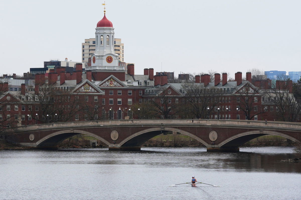 <i>Charles Krupa/AP via CNN Newsource</i><br/>A sculler rows down the Charles River near Harvard University on April 15