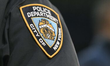 The NYPD logo on a policeman's sleeve is captured on March 11 during a basketball tournament at Madison Square Garden.