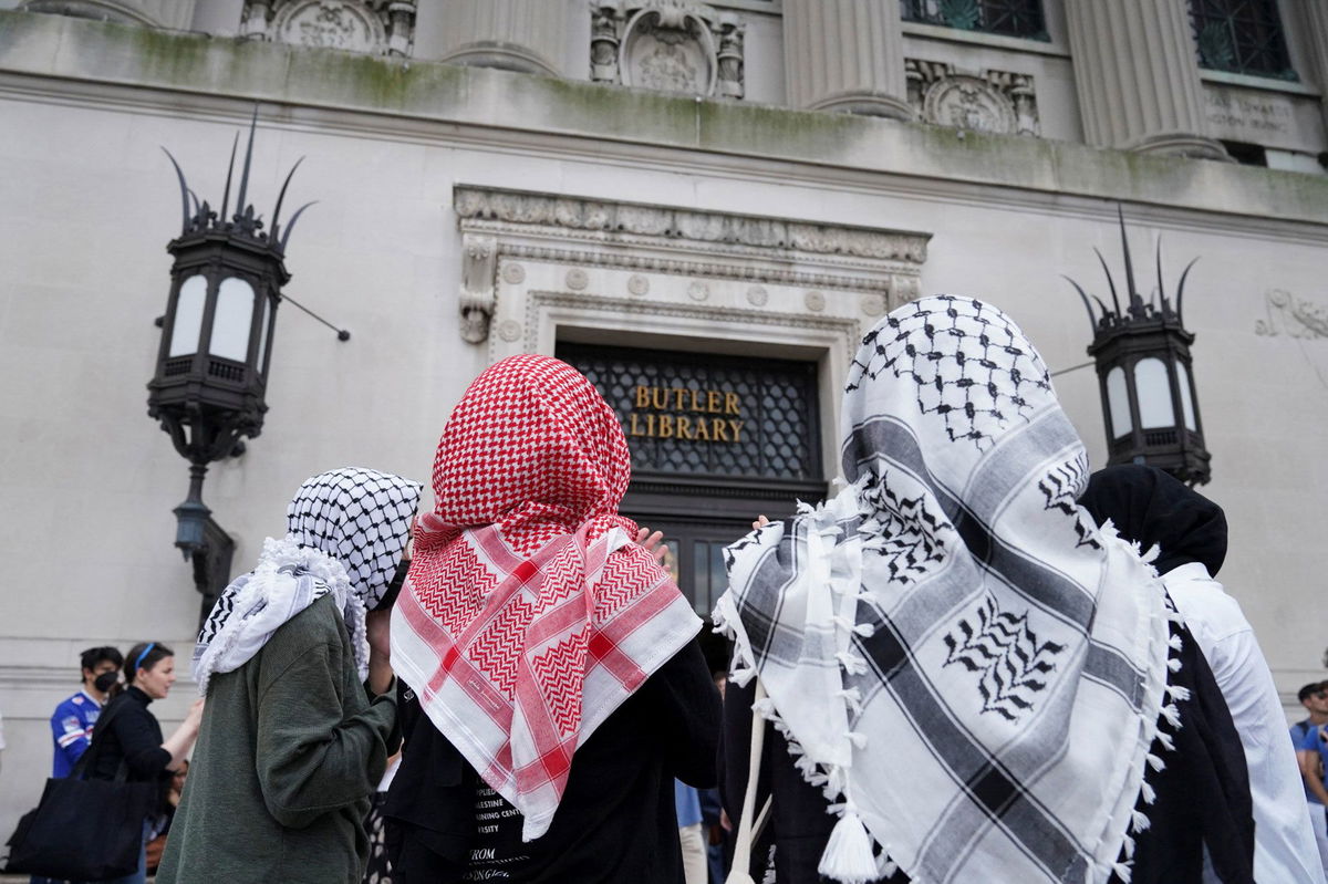 <i>Ryan Murphy/Reuters via CNN Newsource</i><br/>People take part in a pro-Palestinian protest at Butler Library on the campus of Columbia University in New York on May 7.