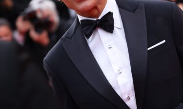 US director Sean Baker poses with the Palme d'Or for the film "Anora" at the Cannes Film Festival on May 25