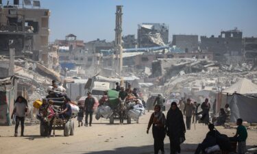 Palestinians in the Gaza Strip flee with their possessions following intensified Israeli military attacks on May 16. The Israeli military says it has launched the first stages of a new major offensive in Gaza.
