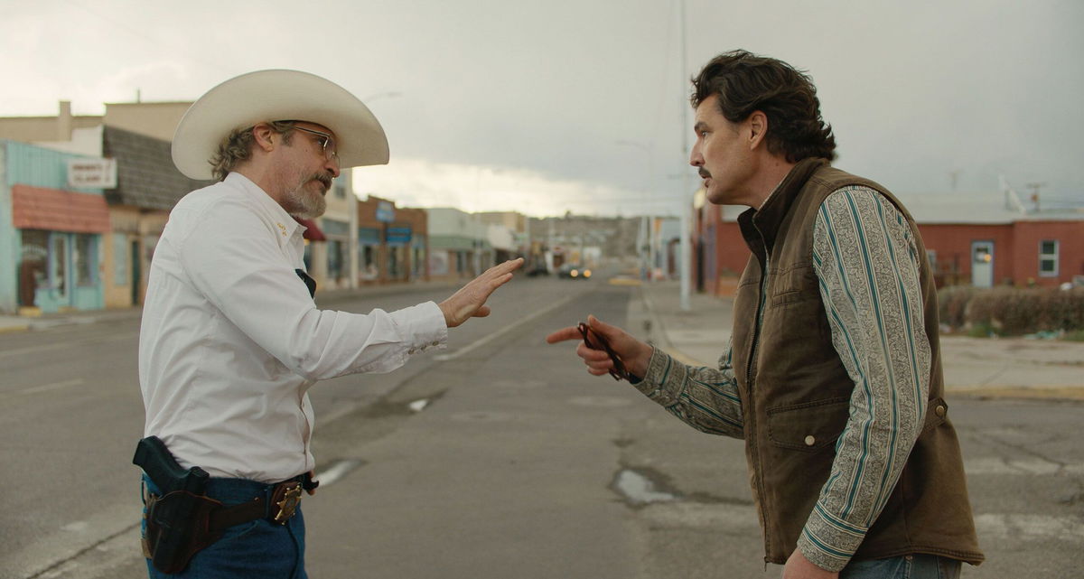 <i>A24 via CNN Newsource</i><br/>Joaquin Phoenix and Pedro Pascal are pictured in “Eddington.” The movie is releasing on July 18.