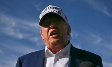 US President Donald Trump speaks to journalists before boarding Air Force One from Morristown Municipal Airport in Morristown