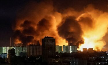 An explosion lights up the sky over Kyiv during a Russian drone strike on Saturday.