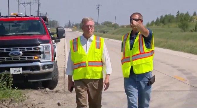<i>KCCI via CNN Newsource</i><br/>An Iowa truck driver was rescued from a burning semi-truck by a road foreman after crashing on a rural bridge over Holiday Creek on June 9.