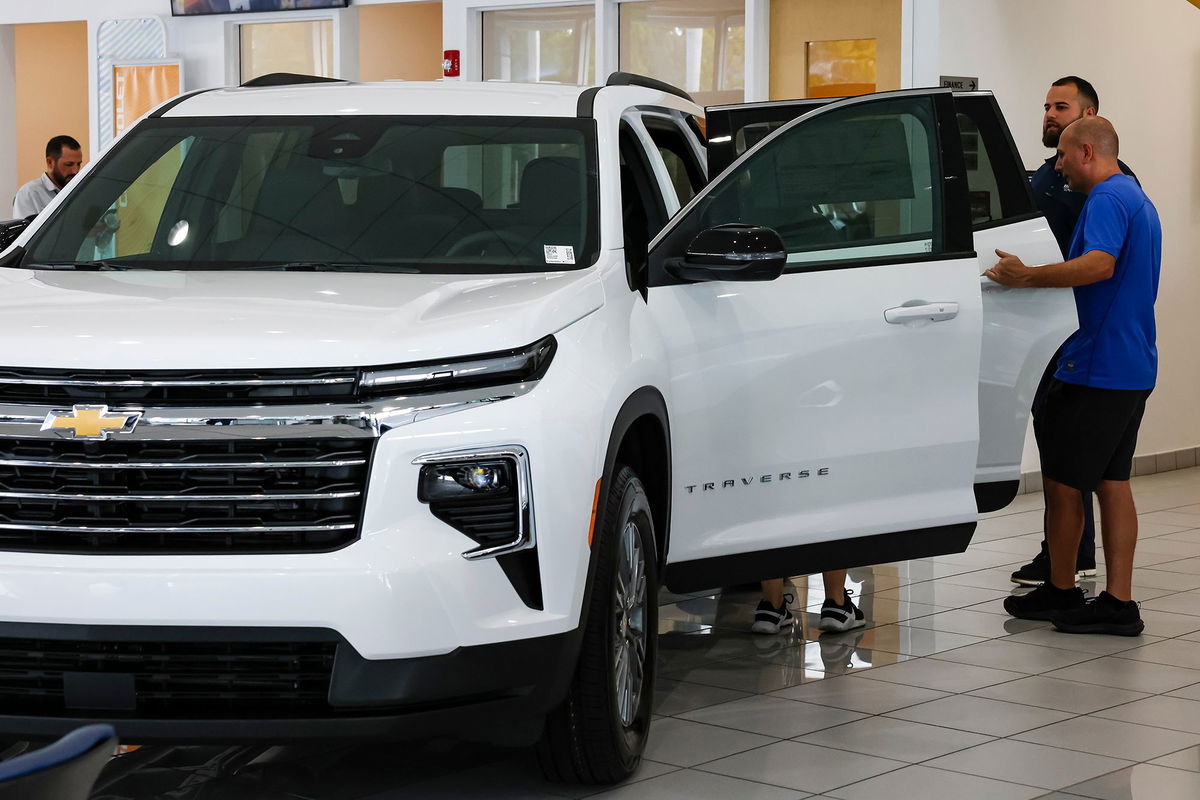 <i>Eva Marie Uzcategui/Bloomberg/Getty Images via CNN Newsource</i><br/>A customer views a new Chevrolet Traverse vehicle for sale at a Chevrolet dealership in Miami