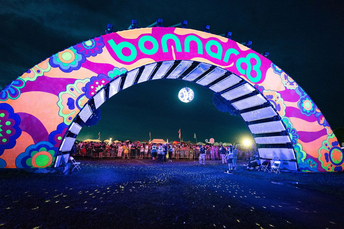 <i>Douglas Mason/WireImage/Getty Images via CNN Newsource</i><br/>Disappointed fans seen at the Bonnaroo Arch after the Bonnaroo Music and Arts Festival 2025 is canceled on June 13